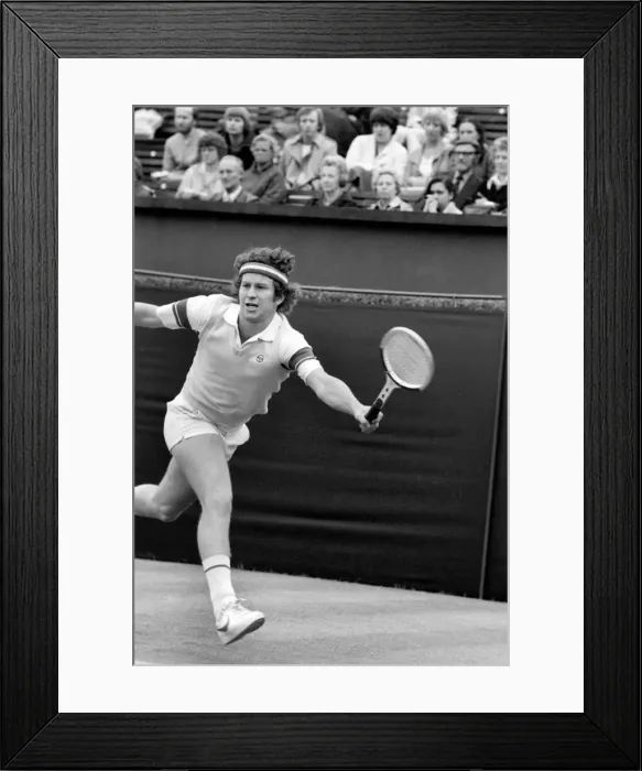 Framed Print : American tennis star John McEnroe in action at Queens Club. June 1980 Framed Print : American tennis star John McEnroe in action at Queens Club. June 1980