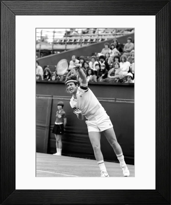Framed Print : American tennis star John McEnroe in action at Queens Club. June 1980 Framed Print : American tennis star John McEnroe in action at Queens Club. June 1980