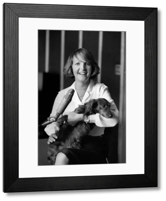 Framed Print : Actress Penelope Keith makes a record about a Dachsund dog. June 1980 80-03067-008