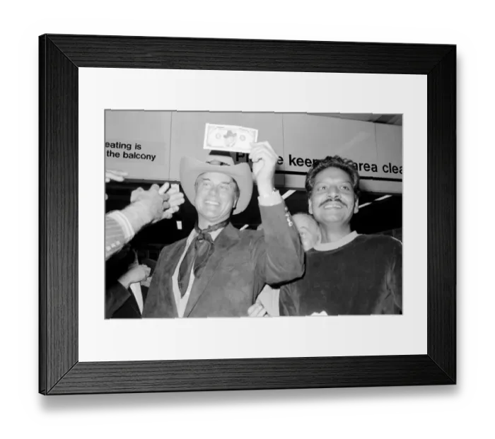 Framed Print : Actor Larry Hagman, Dallass J. R. Ewing, and his wife Maj arrive at London