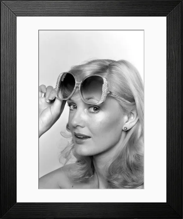 Framed Print : Model Maria wearing a pair of sunglasses. June 1980 80-03010-003 Framed Print : Model Maria wearing a pair of sunglasses. June 1980 80-03010-003