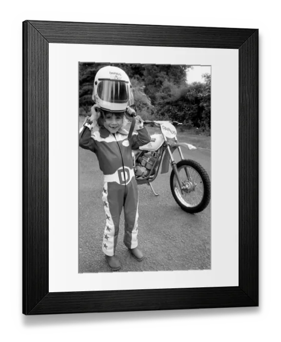 Framed Print : Boy Stunt Rider: 6 year old Darius Goodwin is pictured here prior to him leaping through Framed Print : Boy Stunt Rider: 6 year old Darius Goodwin is pictured here prior to him leaping through