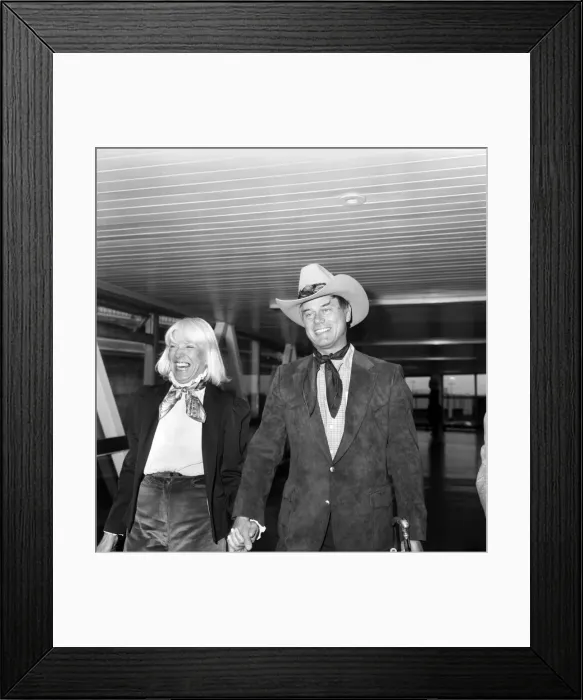 Framed Print : Actor Larry Hagman, Dallass J. R. Ewing, and his wife Maj arrive at London Framed Print : Actor Larry Hagman, Dallass J. R. Ewing, and his wife Maj arrive at London