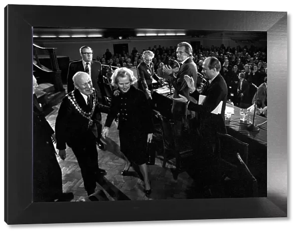 Mrs. Margaret Thatcher Talks to Tradesmen. Mrs. Margaret Thatcher leaves the Hall to a