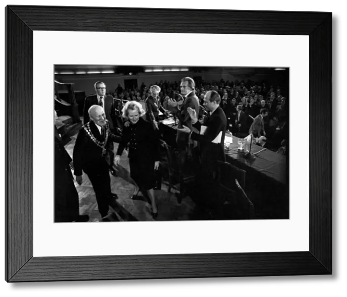 Framed Print : Mrs. Margaret Thatcher Talks to Tradesmen. Mrs. Margaret Thatcher leaves the Hall to a Framed Print : Mrs. Margaret Thatcher Talks to Tradesmen. Mrs. Margaret Thatcher leaves the Hall to a