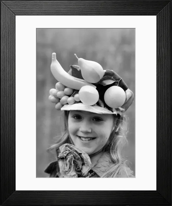 Framed Print : Girl  /  Hat  /  Unusual: Trinidad Carnival in Kensington. February 1975 75-00811-004