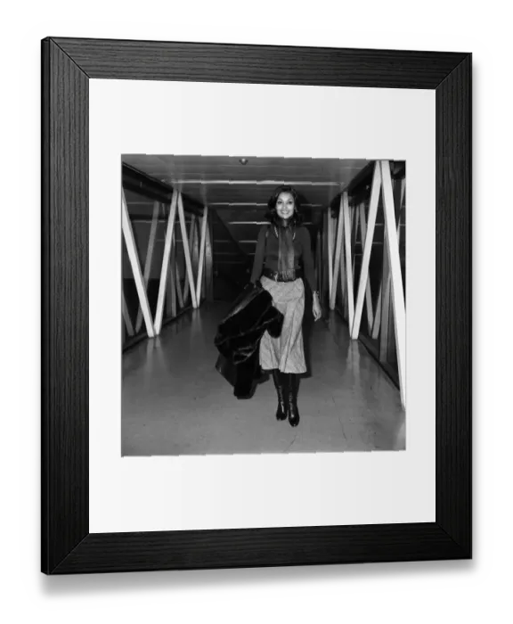 Framed Print : Shakira, wife of actor Michael Caine leaves Heathrow Airport today to join husband in