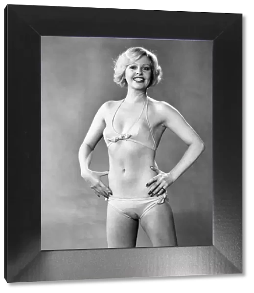 Humour  /  Smiling: Model June Hodgson - in bikini and exercising in a Leotard