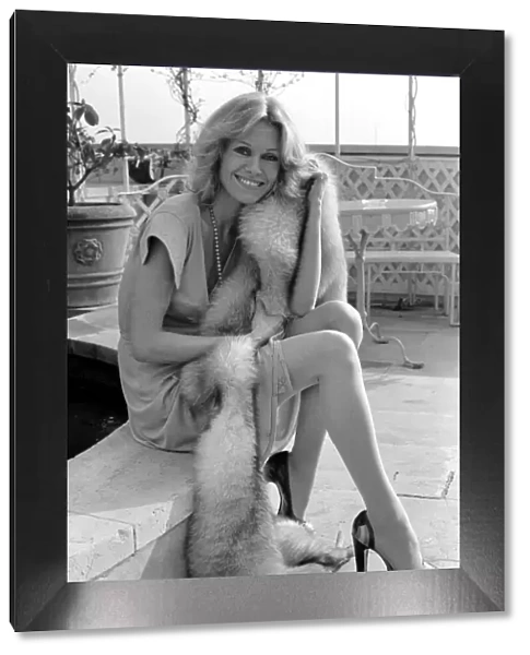 Woman and dog. Suzanna Leigh at todays photo session with her poodle Natashia