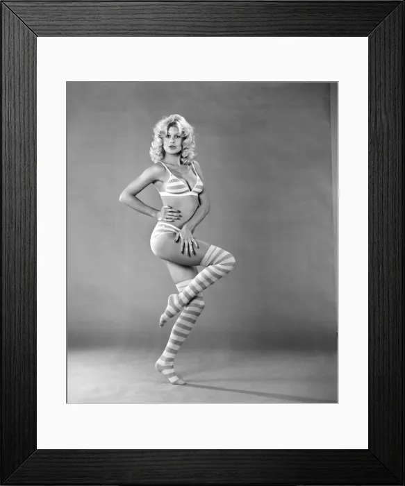 Framed Print : Glamour. Stocking Fashion. Jilly Johnson. February 1975 75-00713-005