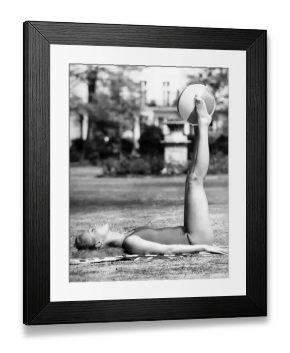 Framed Print : Flat on your back first, then lift your legs up straight to flatten the stomach Framed Print : Flat on your back first, then lift your legs up straight to flatten the stomach