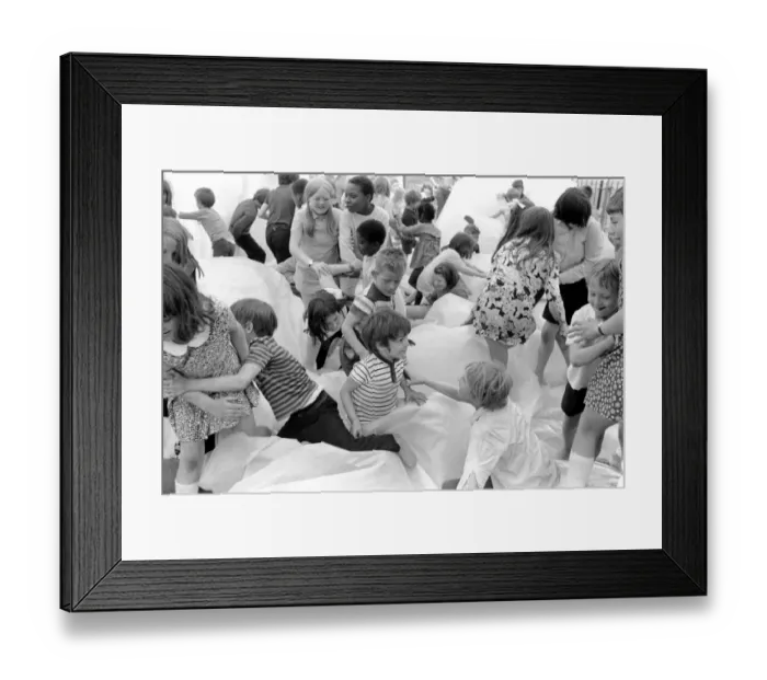 Framed Print : Kids in the Park: It was shoes off in Tabbard Gardens, Bermondsey, today (Saturday) Framed Print : Kids in the Park: It was shoes off in Tabbard Gardens, Bermondsey, today (Saturday)