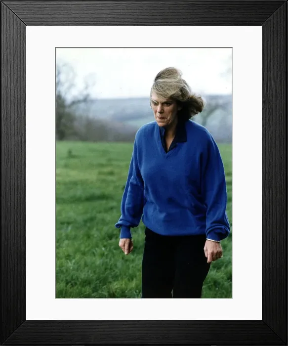 Framed Print : Camilla Parker Bowles strolling in the grounds of her Wiltshire home this morning friend Framed Print : Camilla Parker Bowles strolling in the grounds of her Wiltshire home this morning friend