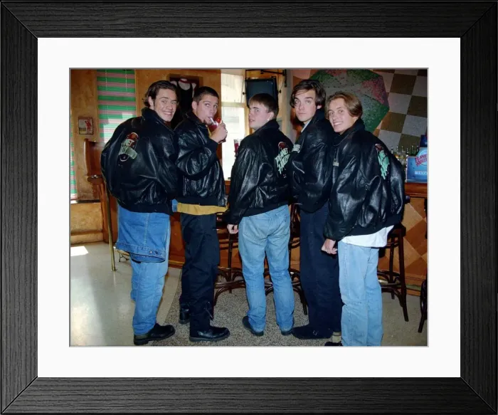 Framed Print : Pop group Take That enjoying a drink in a bar before a signing Framed Print : Pop group Take That enjoying a drink in a bar before a signing