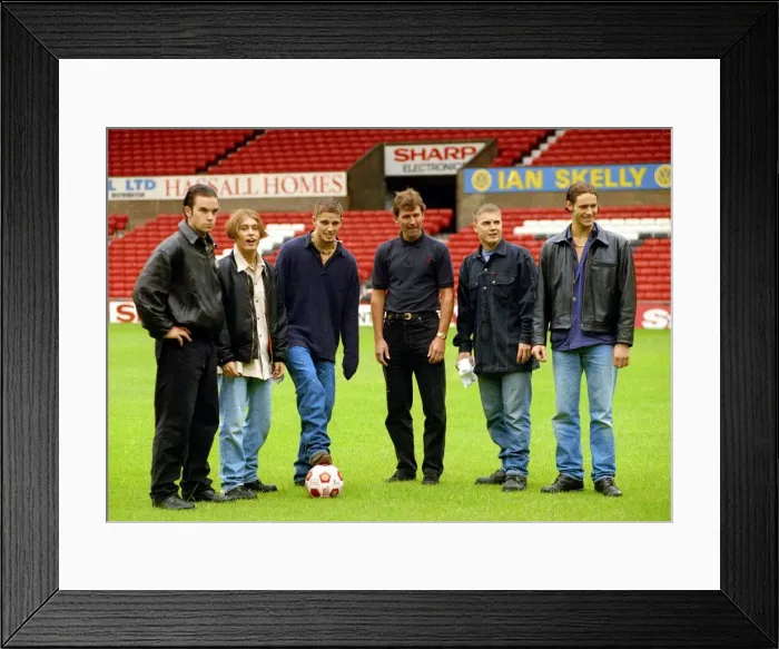 Framed Print : Members of pop group Take That left to right: Robbie Williams, mark Owen, Jason orange Framed Print : Members of pop group Take That left to right: Robbie Williams, mark Owen, Jason orange
