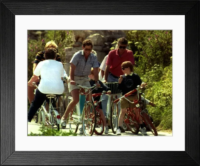 Framed Print : Prince Charles on holiday with Prince William and Prince Harry accompanied by detectives
