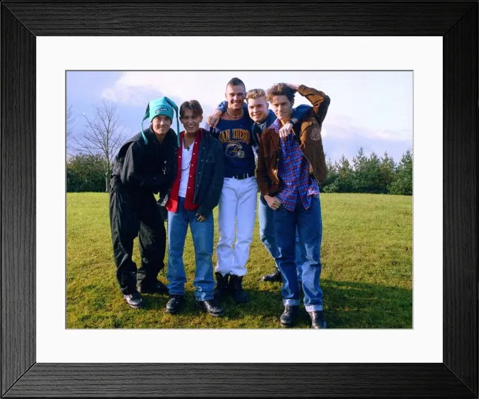 Framed Print : Pop group Take That pose for group photographs. Left to right are: Robbie Williams Framed Print : Pop group Take That pose for group photographs. Left to right are: Robbie Williams