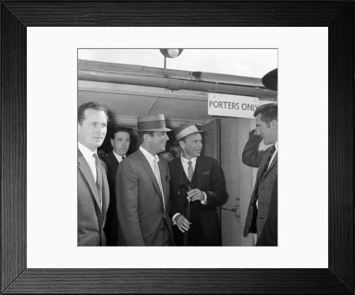 Framed Print : Frank Sinatra seen here arriving at Heathrow airport in the summer of 1961 with Dean
