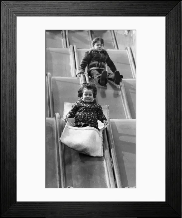 Framed Print : The Spanish City amusement park in Whitley Bay - youngsters enjoying the giant slide