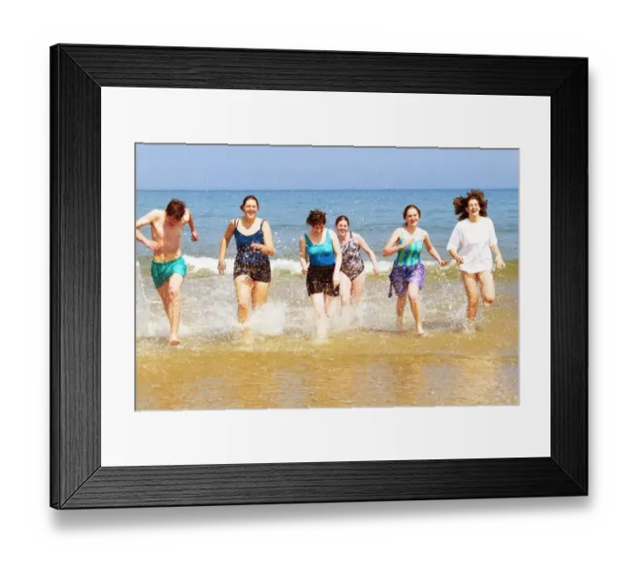Framed Print : Enjoying the sun on Tynemouth beach are these Newcastle University students who have now Framed Print : Enjoying the sun on Tynemouth beach are these Newcastle University students who have now