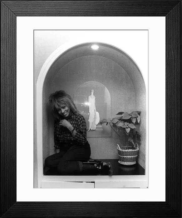 Framed Print : Singer Tina Turner on tour photographed in her hotel room in Paris Framed Print : Singer Tina Turner on tour photographed in her hotel room in Paris