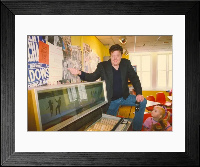 Framed Print : Former bassist of The Animals pop group Chas Chandler (left) Framed Print : Former bassist of The Animals pop group Chas Chandler (left)