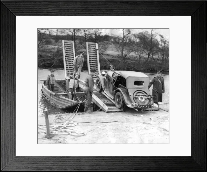 Framed Print : The problem of transporting a car across a river is soon solved by Royal lEngineers with