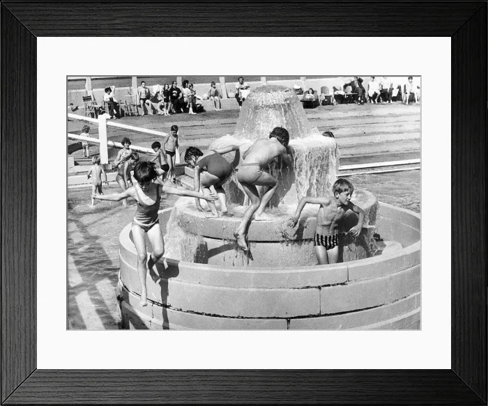 Framed Print : Time to cool off because, for once, the sun is shining. children splash about inTynemouth Framed Print : Time to cool off because, for once, the sun is shining. children splash about inTynemouth