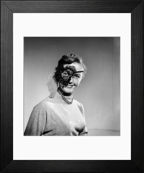 Framed Print : Clothing: Woman wearing party mask. 1955 B89