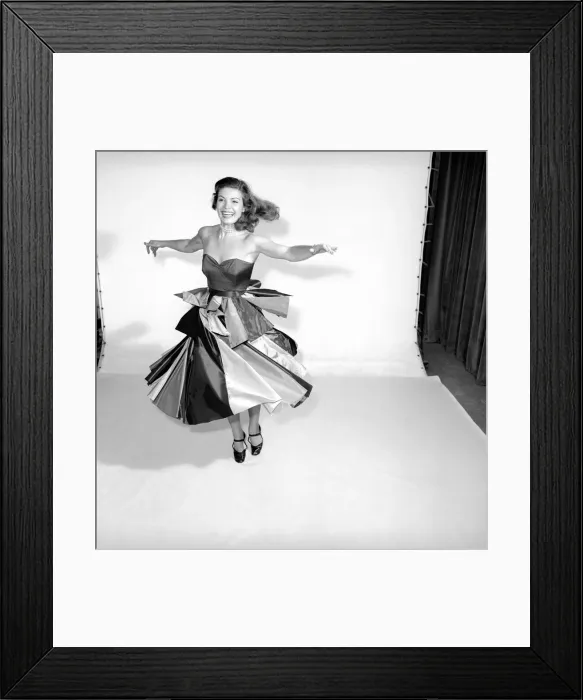 Framed Print : Clothing: Fashion: Skirts: Woman wearing flying panel dress. Model: Pat Owens