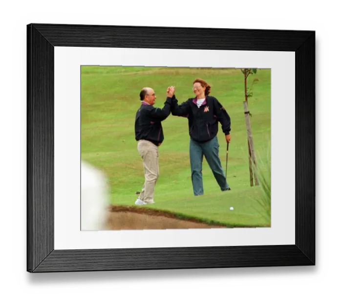 Framed Print : British billionaire Joe Lewis July 1997 on golf course at Turnberry Hotel high five