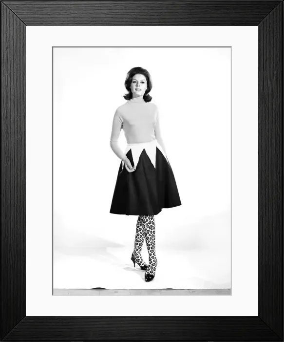 Framed Print : Gloria James modelling a skirt that can convert to a cape. 1962 B1848-002 Framed Print : Gloria James modelling a skirt that can convert to a cape. 1962 B1848-002