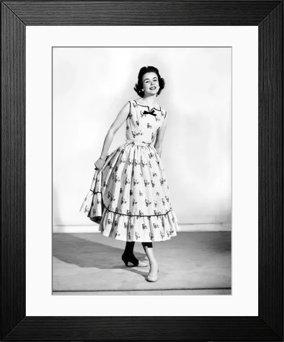 Framed Print : Clothing: Fashion: Dresses. Woman wearing full length dress with matching gloves