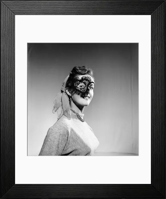Framed Print : Clothing: Woman wearing party mask. 1955 B89-002 Framed Print : Clothing: Woman wearing party mask. 1955 B89-002