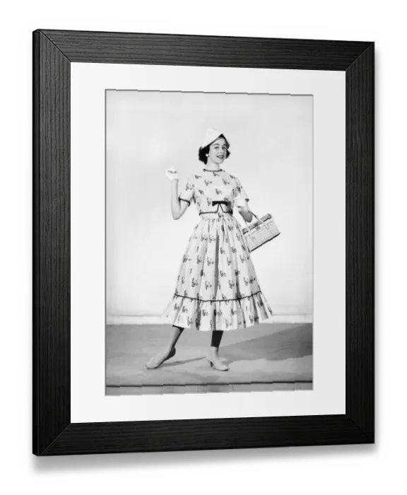 Framed Print : Clothing: Fashion: Dresses. Woman wearing full length dress with matching gloves