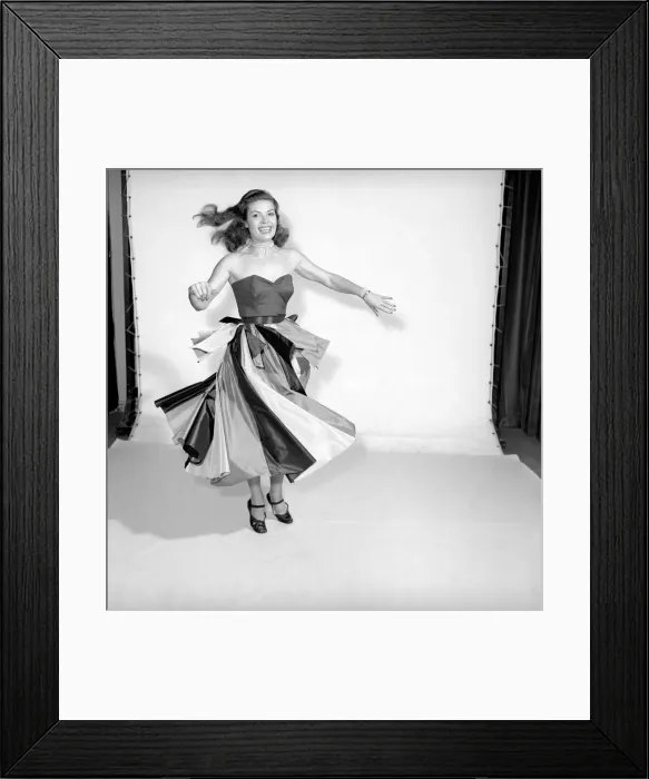 Framed Print : Clothing: Fashion: Skirts: Woman wearing flying panel dress. Model: Pat Owens. 1956 B259 Framed Print : Clothing: Fashion: Skirts: Woman wearing flying panel dress. Model: Pat Owens. 1956 B259