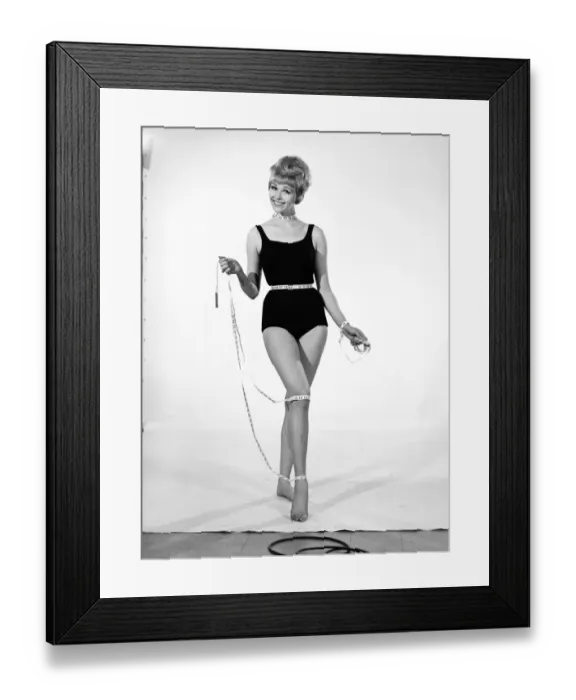 Framed Print : Clothing: Fashion: Beachwear. Woman wearing swimming costume and tape measure Framed Print : Clothing: Fashion: Beachwear. Woman wearing swimming costume and tape measure
