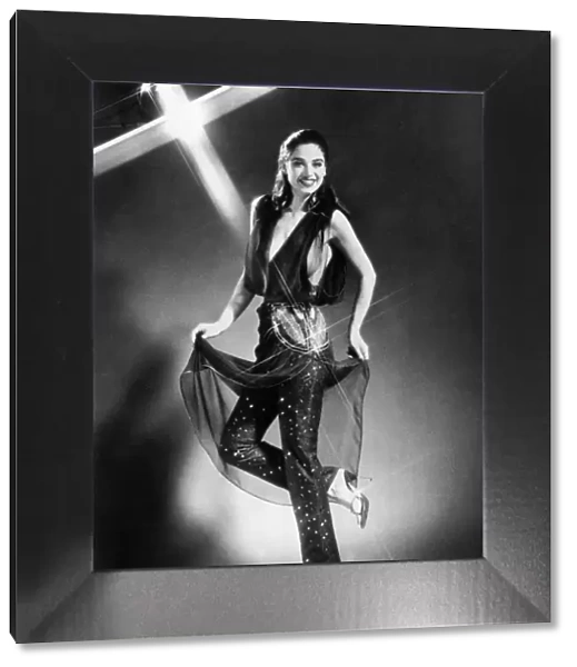 Model wearing a daring chiffon top with narrow trousers. April 1979 P007868
