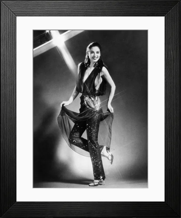 Framed Print : Model wearing a daring chiffon top with narrow trousers. April 1979 P007868 Framed Print : Model wearing a daring chiffon top with narrow trousers. April 1979 P007868