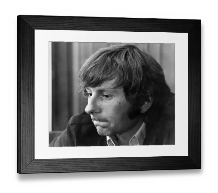 Framed Print : Film Director Roman Polanski seen in his Belgravia mews house. January 1969 P007141 Framed Print : Film Director Roman Polanski seen in his Belgravia mews house. January 1969 P007141
