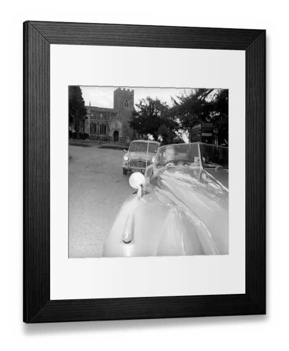 Framed Print : Inventor Jim Pickering seen here behind the wheel of his jaguar sports car which has been Framed Print : Inventor Jim Pickering seen here behind the wheel of his jaguar sports car which has been