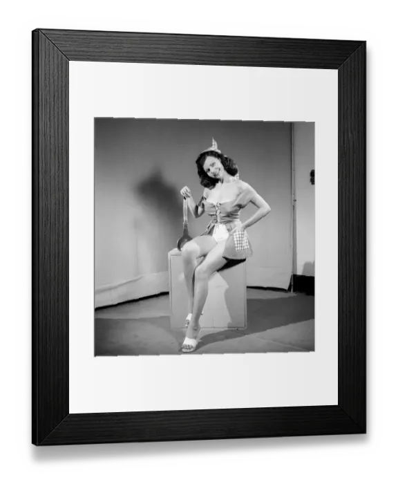 Framed Print : The Mechanic: Woman in fancy dress holding large spanner. 1959 E26 Framed Print : The Mechanic: Woman in fancy dress holding large spanner. 1959 E26