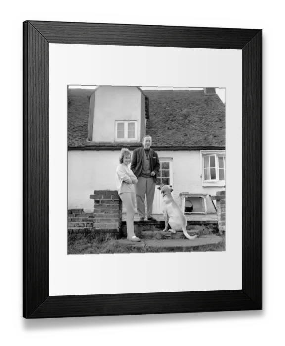 Framed Print : TV actor Hugh Lloyd seen here at home with his wife and pet dog. 1960 A1098-004