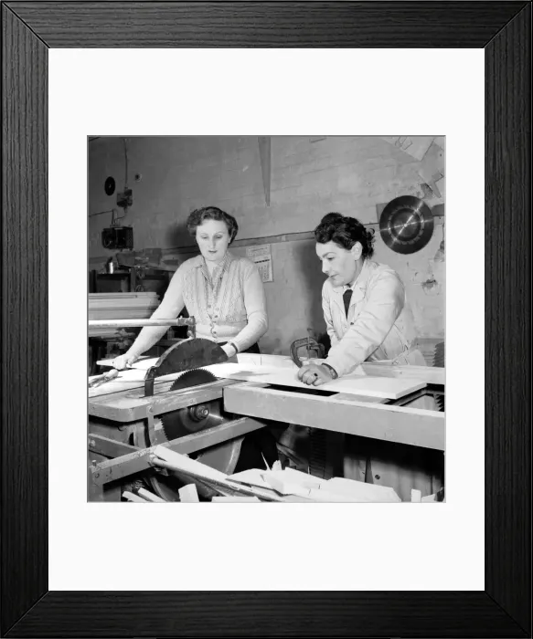 Framed Print : Women carpenters constructing an ironing board in a workshop. 1954 A95-003 Framed Print : Women carpenters constructing an ironing board in a workshop. 1954 A95-003