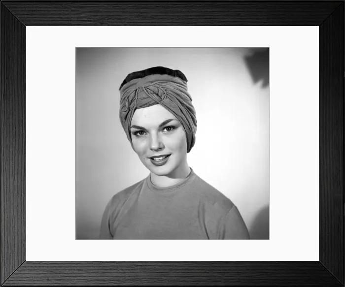 Framed Print : Model Mary Dixon wearing a hat that can be converted into a face mask. April 1956 Framed Print : Model Mary Dixon wearing a hat that can be converted into a face mask. April 1956