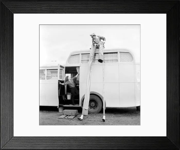 Framed Print : Entertainment: Circus: Barrie Sloan, Billy Smartes stilt walker seen here washing Framed Print : Entertainment: Circus: Barrie Sloan, Billy Smartes stilt walker seen here washing