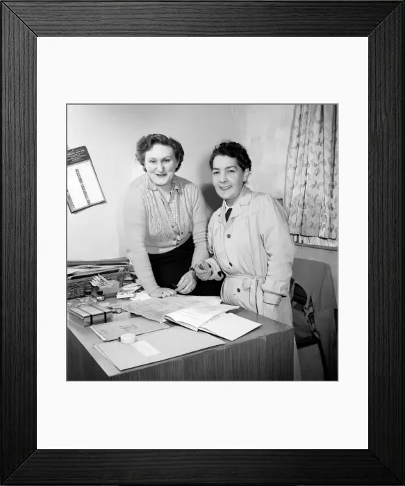 Framed Print : Women carpenters checking the records in their office. 1954 A95-002 Framed Print : Women carpenters checking the records in their office. 1954 A95-002