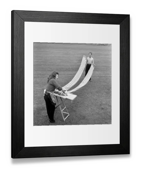 Framed Print : Entertainment: Circus: Barrie Sloan, Billy SmartIs stilt walker seen here washing Framed Print : Entertainment: Circus: Barrie Sloan, Billy SmartIs stilt walker seen here washing