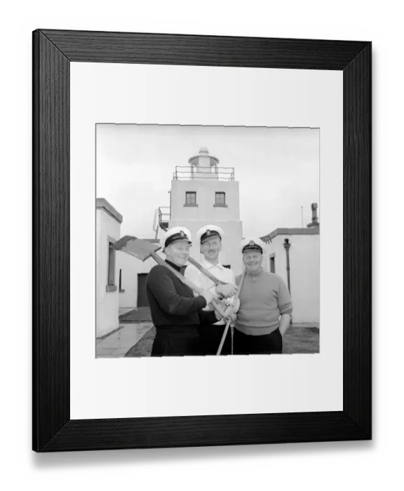 Framed Print : The lighthouse keepers and their families go about their daily duties around The Strathy