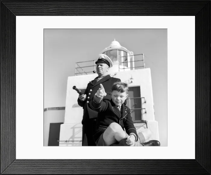 Framed Print : The lighthouse keepers and their families go about their daily duties around The Strathy Framed Print : The lighthouse keepers and their families go about their daily duties around The Strathy